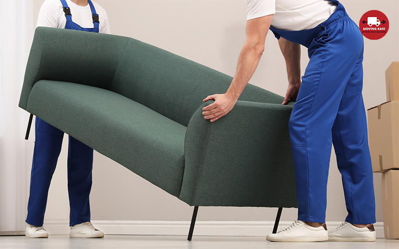 Male Movers Carrying Sofa 